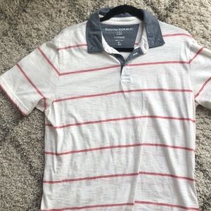 White polo with red stripes